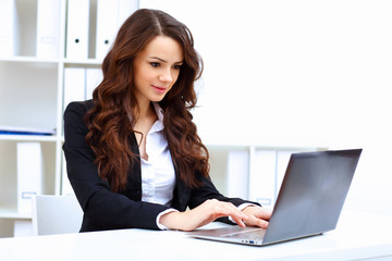 Young busines woman with notebook