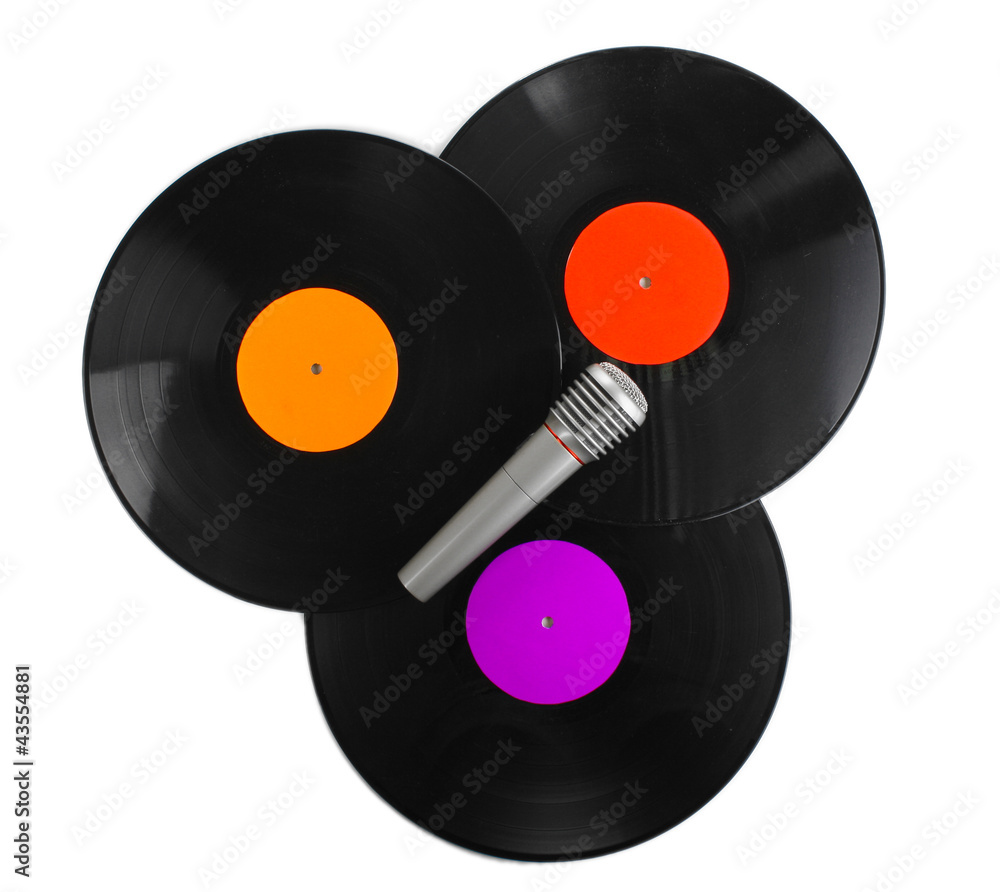 Black vinyl records and microphone isolated on white