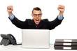 © stockyimages - Excited businessman shouting and rejoicing