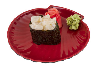 spice sushi hotate with sauced slices of scallop isolated on whi