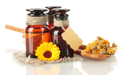 medicine bottles and calendula, isolated on white