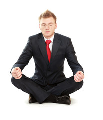 Wall Mural - A young guy sitting on the floor