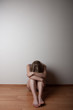 © listercz - depressed young lonely woman girl, sitting on the floor alone