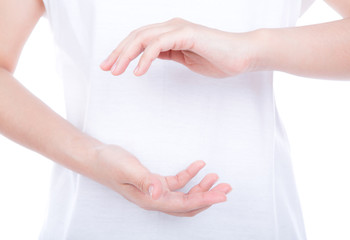 Wall Mural - Empty woman hands over body isolated on background.