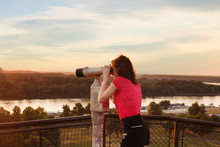 Looking Through Sightseeing  Binoculars