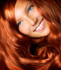 Wall Mural - Hair. Beautiful Girl With Healthy Long Red Curly Hair