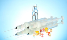 Syringes Monovet, Ampoules And Pills On Blue Background