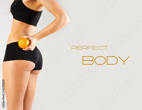 Naklejka ścienna Concept of a healthy body. Beautiful bottom, fruit