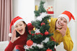 © Alliance - Young couple having fun Christmas time