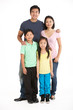 © Monkey Business - Full Length Studio Shot Of Chinese Family