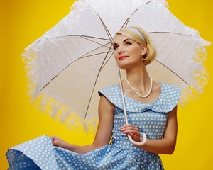 Canvas Print - Woman in blue dress with a parasol