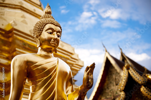 Obraz na płótnie canvas dwuczęściowy "dyptyk" Złota statua Buddy w Tajlandii świątyni Buddy.
