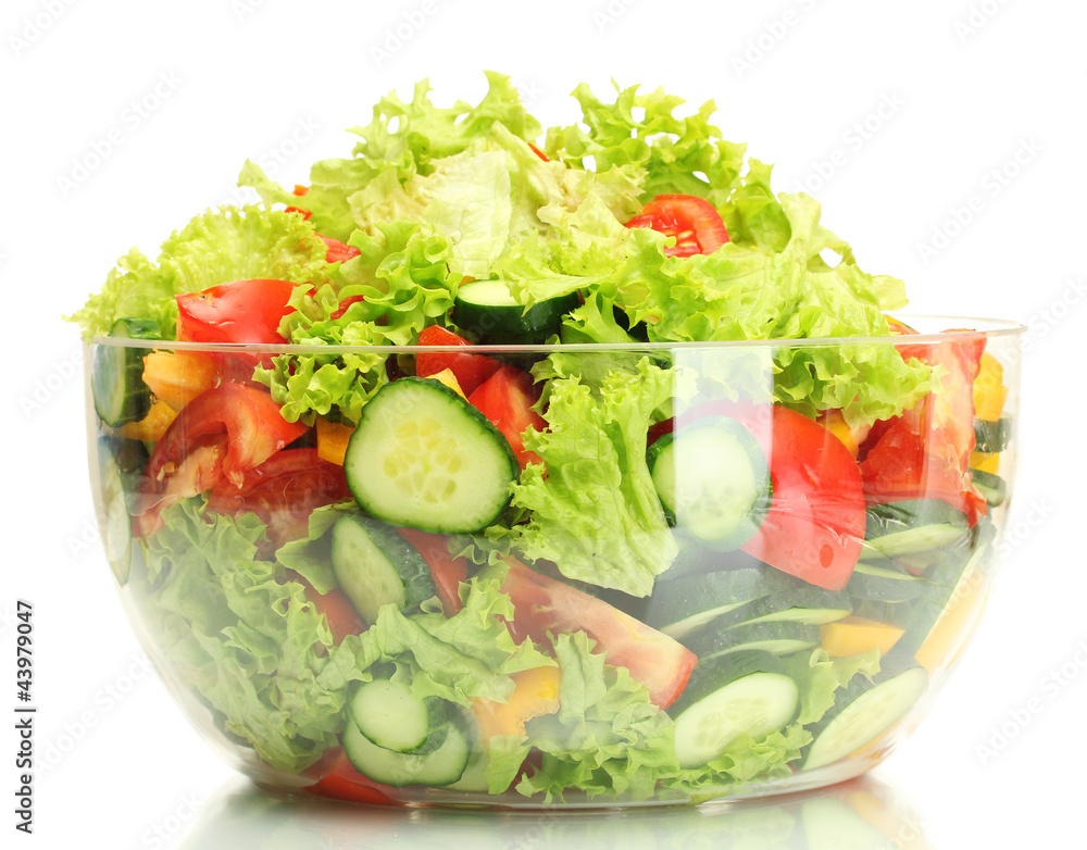 fresh vegetable salad in transparent bowl isolated on white