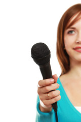 Smiling woman with microphone isolated on white.