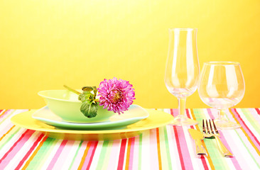 Table setting on bright background close-up