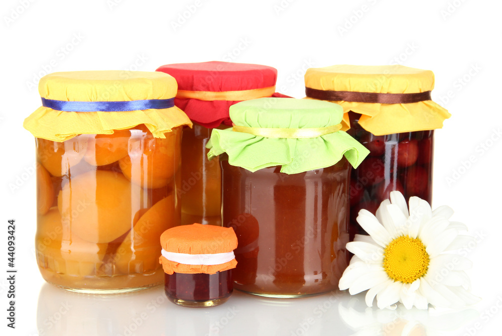 Jars with canned fruit isolated  on white
