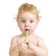© Andrey Kuzmin - child brushing teeth isolated on white