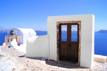 Wall Mural - Beautiful architecture in the village of Oia, Santorini, Greece