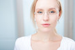 © listercz - Closeup portrait of a intelligent young woman wearing glasses