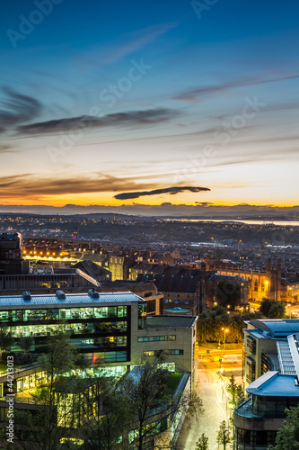 Sunset over the lighted city