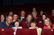 © Monkey Business - Family Watching Film In Cinema