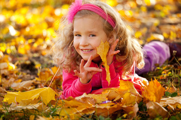 Sticker - Happy girl in autumn park