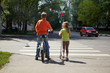 © Pavel Losevsky - Boy with bicycle and his younger sister with scooter