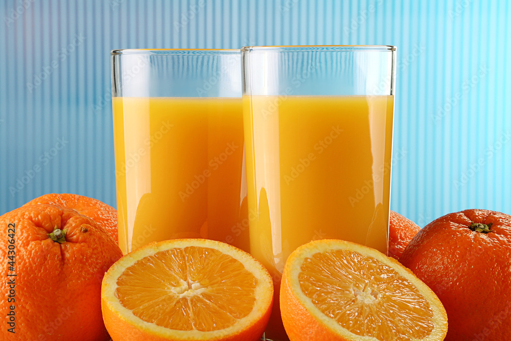 Glasses of orange juice and fruits - obrazy, fototapety, plakaty 