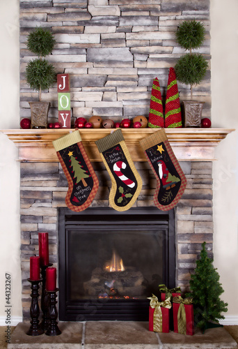 Christmas Stockings Hanging From A Mantel Or Fireplace Buy This