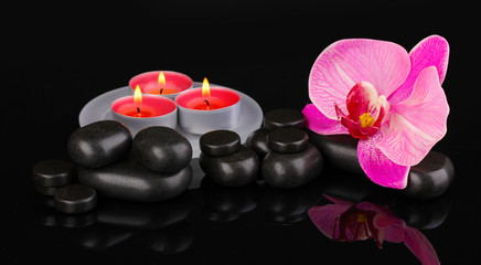 Sticker - Spa stones with orchid flower and candles isolated on black