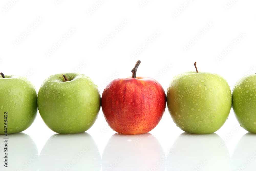 Ripe green apples and one red apple isolated on white
