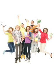 Wall Mural - A group of young and happy teenagers jumping together