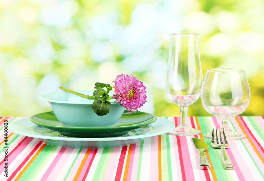 Table setting on bright background close-up