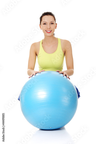 Plakat Kobieta z piłką fitness