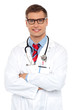 © stockyimages - Attractive portrait of confident male doctor
