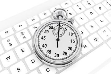 White computer keyboard with stopwatch