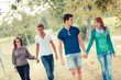 © william87 - Group of Teenagers Walking Holding Hands