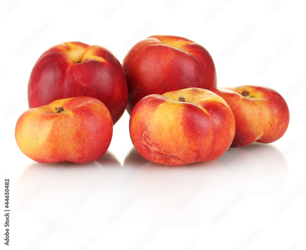 Ripe nectarines isolated on white close-up