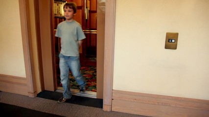 Wall Mural - Automatic doors opens and little boy comes out from elevator