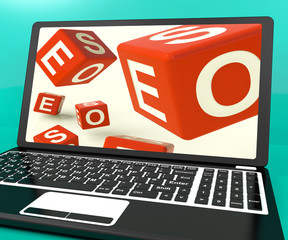 Seo Dice On Laptop Showing Online Web Optimization