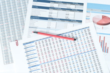 Pen Over Financial Reports