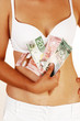 © 80Feierabend - Girl in underwear with money.