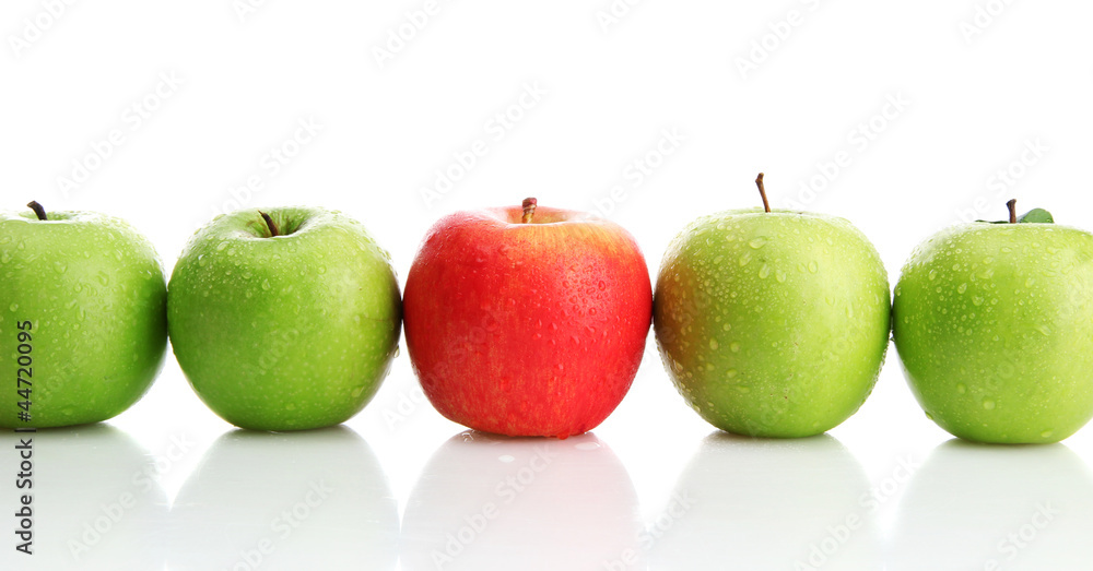 Ripe green apples and one red apple isolated on white