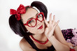 © linavita - girl in the red spectacles with a bow