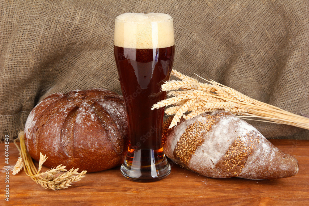 glass of kvass with bread on canvas background close-up