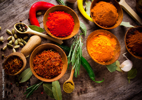 Assorted spices with fresh herbs Canvas Print