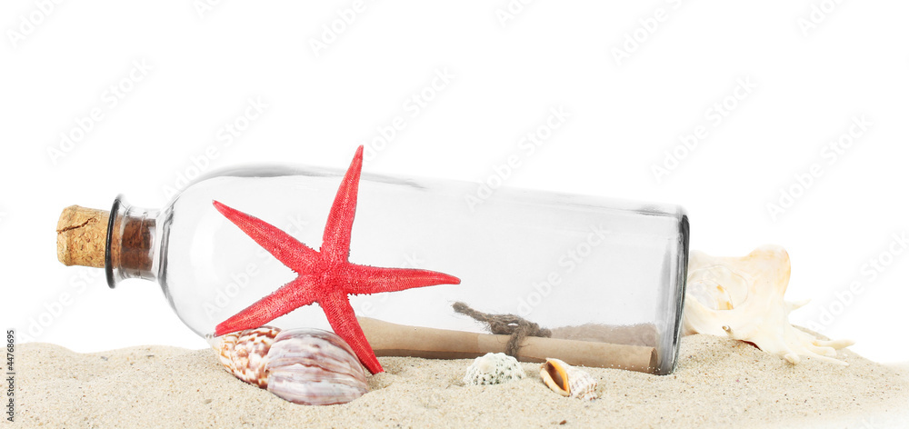 Glass bottle with note inside on sand isolated on white