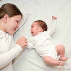 mother with small newborn baby