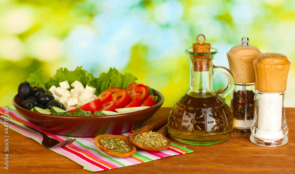 tasty greek salad on bright green background