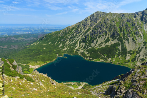 Board z aluminiowym obramowaniem Czarny staw gasienicowy from koscielec mountain.